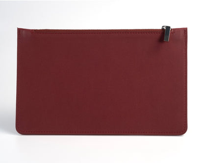 City clutch bag in burgundy leather