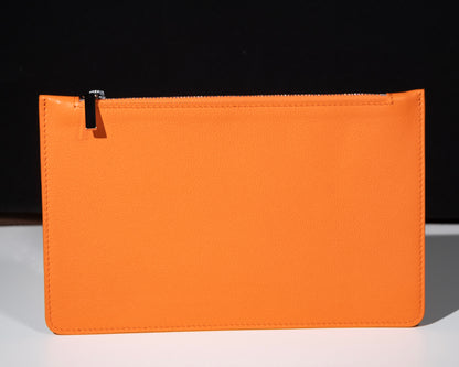 Orange leather city pouch
